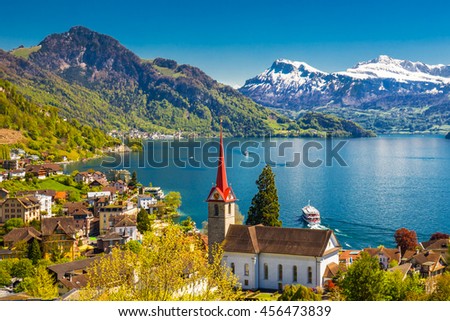 Famous boats on lake Lucerne (Vierwaldstatersee) in Weggis village with the view of Pilatus mountain and Swiss Alps in the background near famous Lucerne (Luzern) city, Switzerland Royalty-Free Stock Photo #456473839