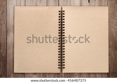 Notebook note pad page picture vintage concept on wooden plank background