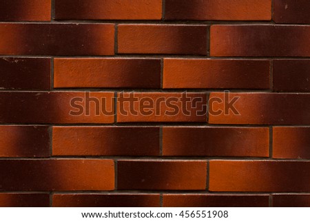Brown brick wall. Can be used for design, websites, interior, background, texture creation, the use of graphic editors, illustration, to create seamless textures.