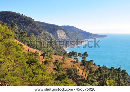 Black Sea coast in the area of Janhot and Praskoveevka. View of the blue sea from the surrounding mountains. You can see the rock Sail. Royalty-Free Stock Photo #456575020
