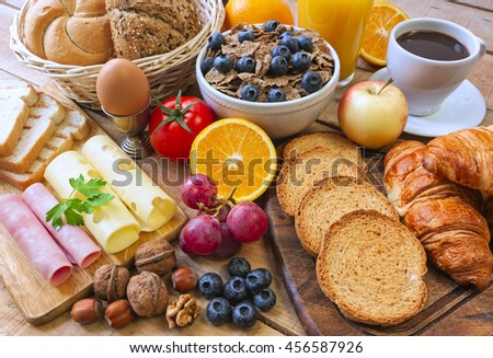continental breakfast - food on background Royalty-Free Stock Photo #456587926