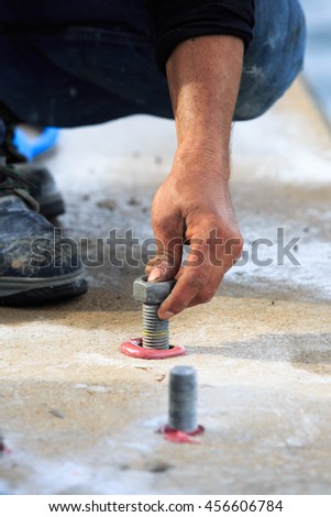 Setting stud bolt into adhesive chemical  anchor