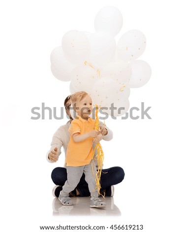 family, childhood, birthday, holidays and people concept - happy father and and little son with bunch of balloons