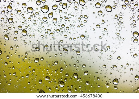 raindrops stick window glass, background