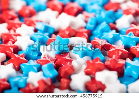 Celebrating Independence Day in USA.  4th of July Theme Background with Red, White, and Blue Star Shaped Candy