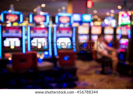 Blurry image of slots machines at the Casino Royalty-Free Stock Photo #456788344