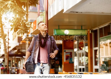 Male tourist in city