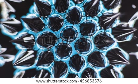 Abstract ferrofluid liquid and watercolor paints Royalty-Free Stock Photo #456853576
