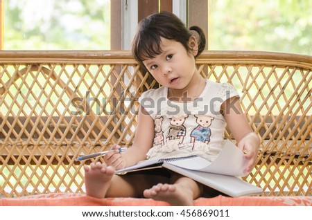 Asian Child Happy draw a picture