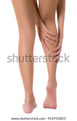 woman hands holding her beautiful healthy long leg with massaging calf in pain area, Isolated on white background.