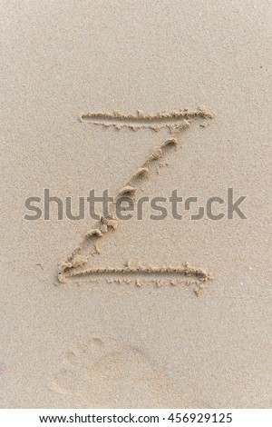 Letter Z of the alphabet writing on the sand