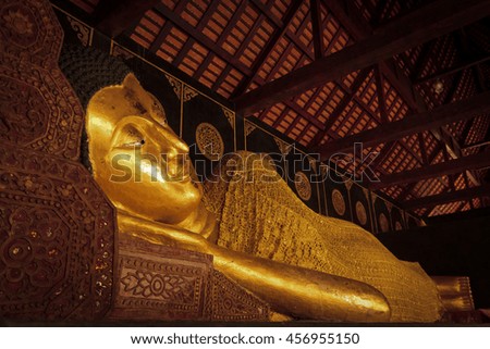 The Beautiful Reclining Buddha in a Buddhist Temple  (This Picture is Taken in a Publice Area and be Permitted to take Picture for Sale)