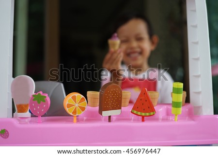 Smile children playing ice cream shop with happily.