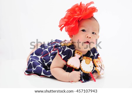 cute baby wear cookies isolated on the white background