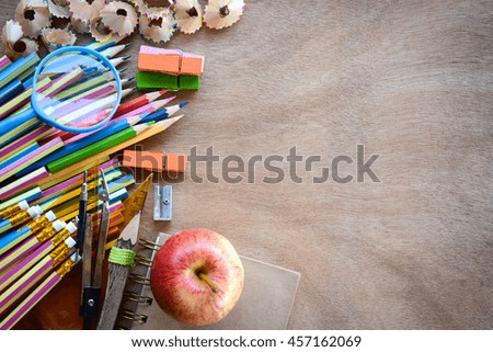 Top view set school supplies on a wooden table with copy space. Back to school