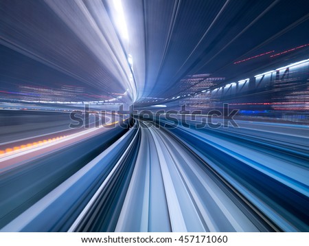 Motion blur of train moving inside tunnel in Tokyo, Japan Royalty-Free Stock Photo #457171060