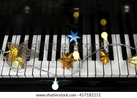 Piano keys with Christmas decorations