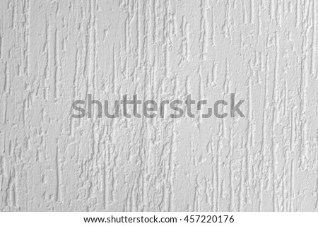 Gentle White Decorative Polymer Finishing Plaster Or liquid Wallpaper Textured Background With Abstract Relief Pattern. Example of finishing concrete walls