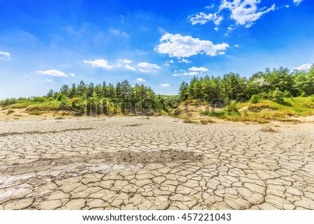 Lake bed drying up due to drought Royalty-Free Stock Photo #457221043