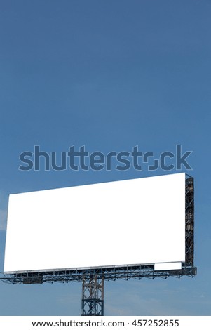 White billboard with blue sky and clouds background