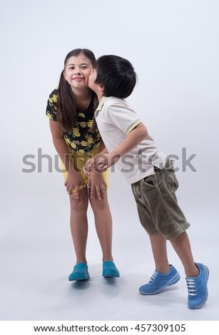 brother sister love family asian kids cute boy girl young happy kiss sibling