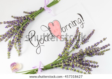 Good morning card with lavender flowers decoration on a table