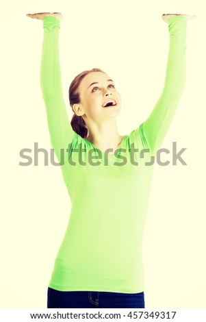 Woman is holding something abstract