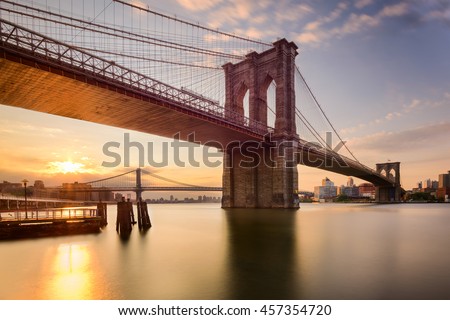 Brooklyn Bridge in New York City at sunrise.