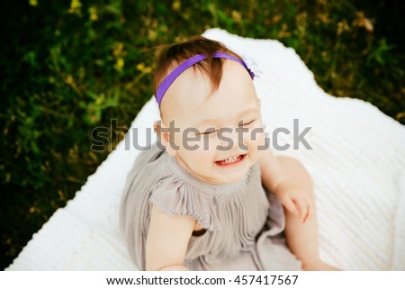 one year old baby girl in forests Royalty-Free Stock Photo #457417567