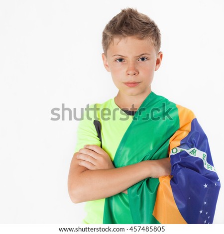 Brazilian patriot and fan boy with Brazil flag. Football or soccer championship. Support. White background