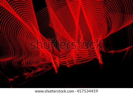 Lights effects  with blurred magic neon light curved lines