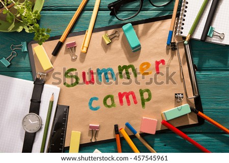 Text Summer camp - written with crayons on the paper