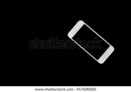 White smartphone on black background