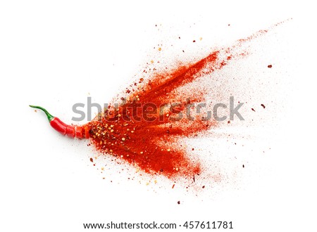 Chili, red pepper flakes and chili powder burst Royalty-Free Stock Photo #457611781