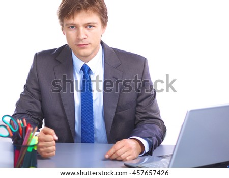 businessman sitting at a desk in the office