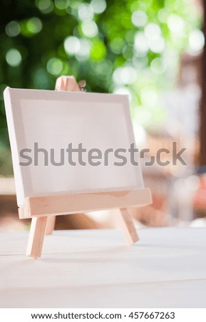 Small easel with a blank canvas