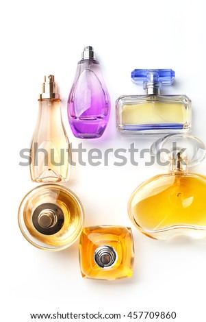 Group of bottles of perfume on a white background
