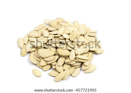 pumpkin seeds on a white background.