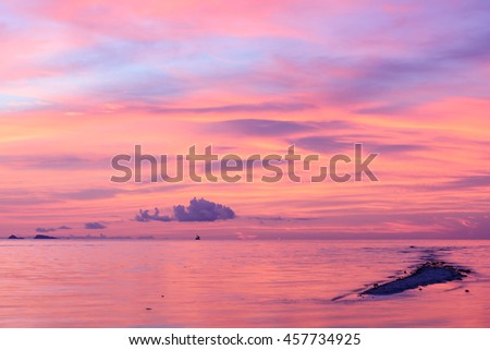 Beautiful fire sunset cloudscape reflection over sea background