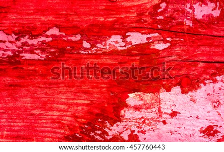 old wood texture with cracked red paint background