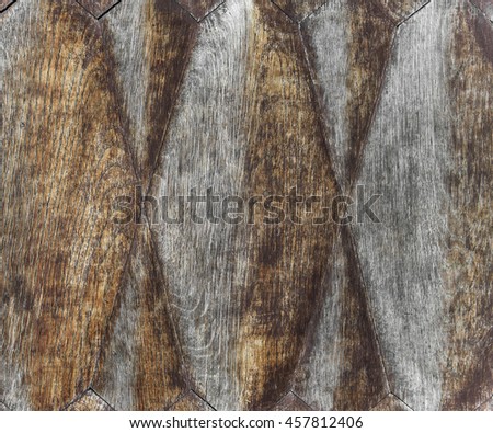 Decorative old wooden ornament for seamless background.