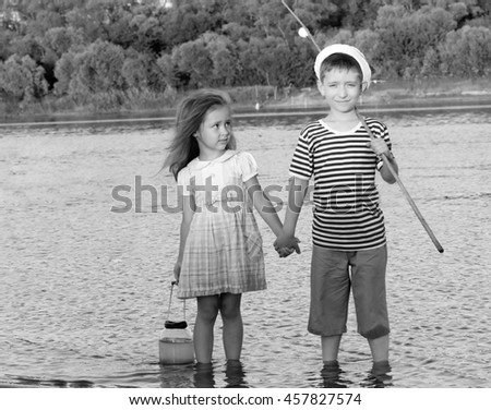 couple, funny boy and girl summer portrait of friend.Black and white photo stylized vintage style
