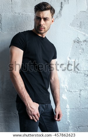 young man on a wall background