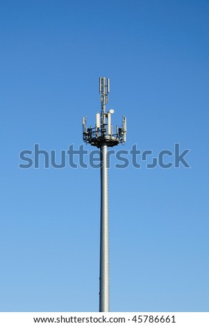 Communication tower on sky background