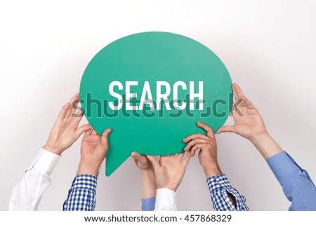 Group of people holding the SEARCH written speech bubble