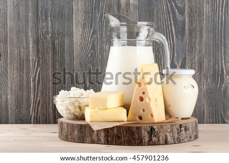 Dairy products on wood Royalty-Free Stock Photo #457901236