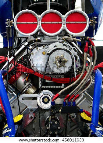 Powerful dragster engine. Front view. Royalty-Free Stock Photo #458011030