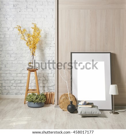 modern brick wall interior with frame and yellow flower