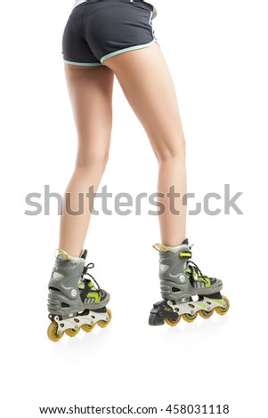 Close up  picture of woman's legs with rollerskates 
