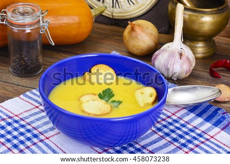 Carrot, Pumpkin Cream Soup with Egg Diet Food. Studio Photo